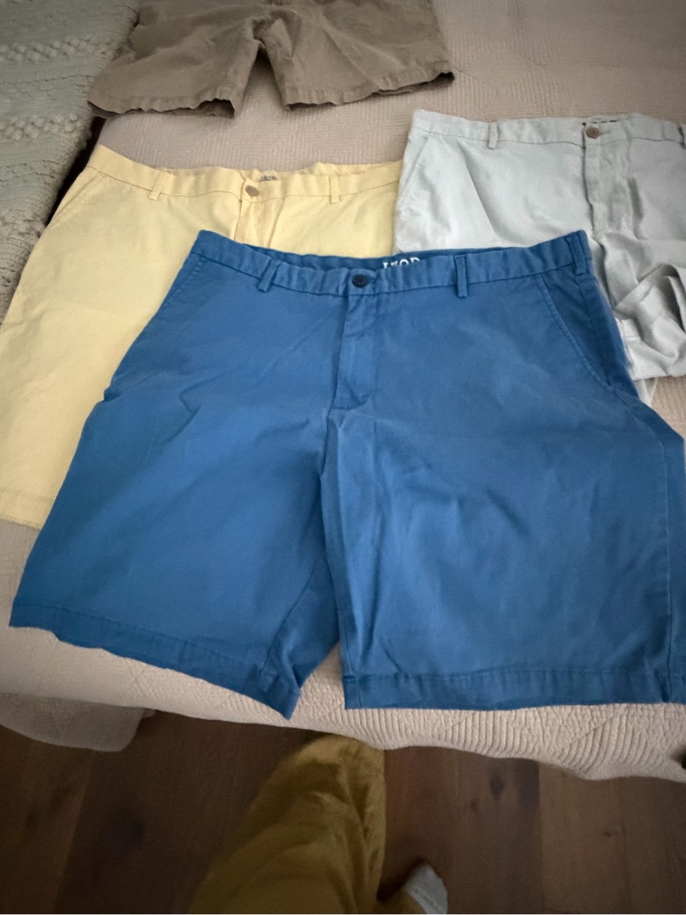 Izod Chino Shorts Stack — Yellow, Red, Blue, White - Picture 8 of 8